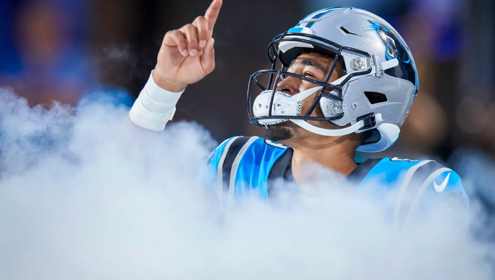 Bryce Young walking in the fog