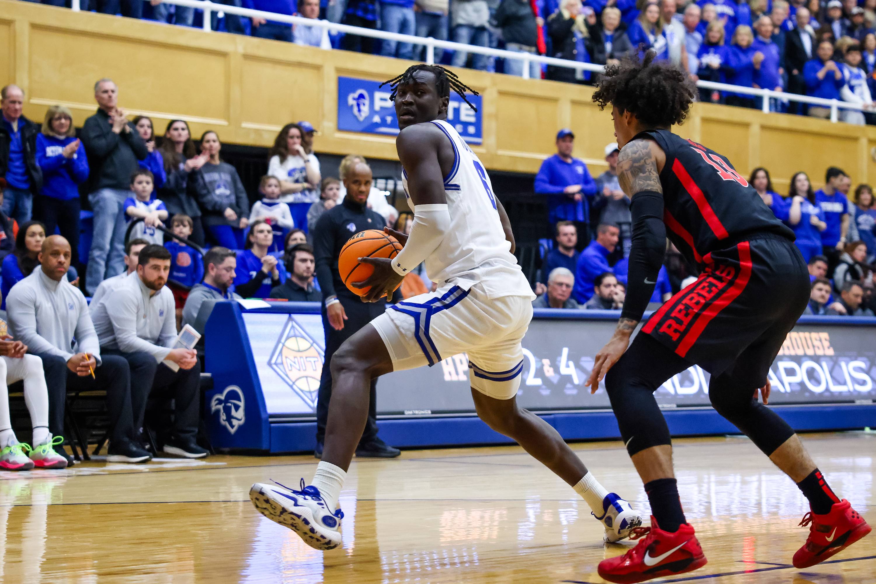 David Tubek (left) playing in a game for the Pirates against UNLV.