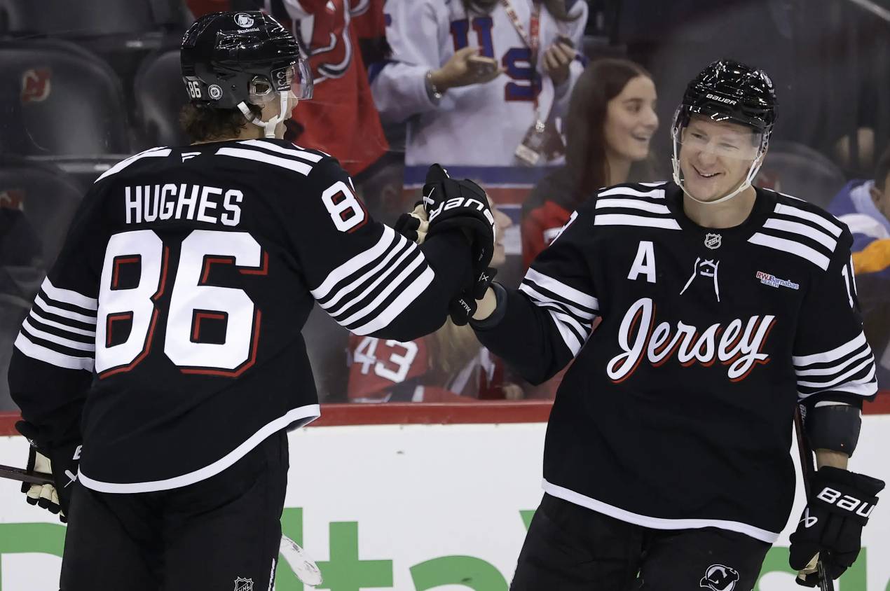 Devils after scoring a goal against the Kings