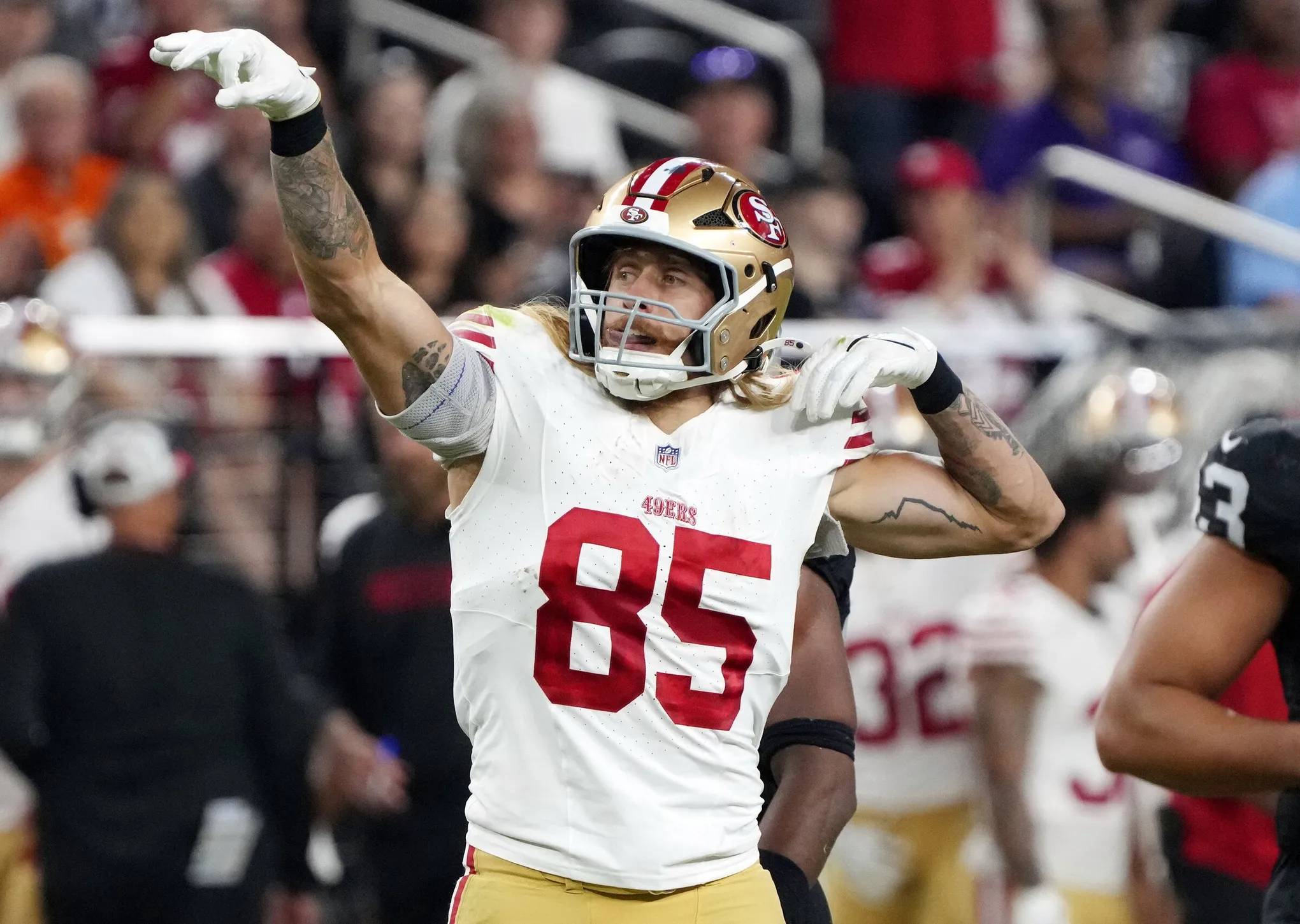 George Kittle celebrates a first down