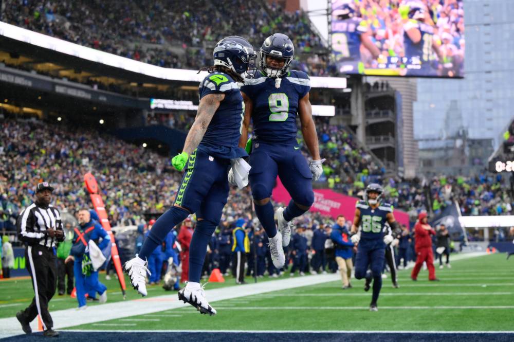 Seahawks WR Jaxon Smith-Njigba (left) and RB Kenneth Walker III (right)