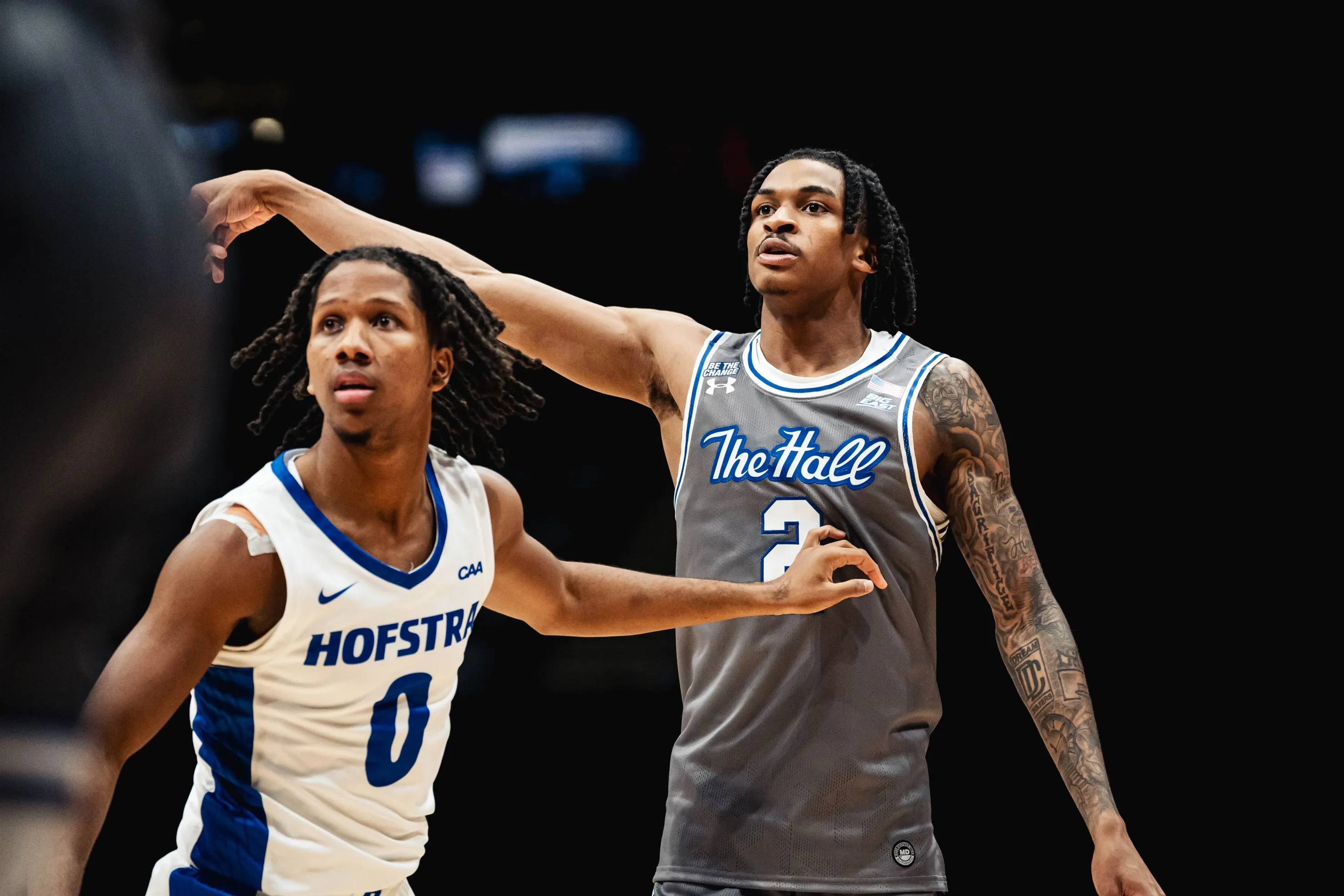 Chaunce Jenkins (right) surpassed 1,000 career points with his 18-point performance against Hofstra.