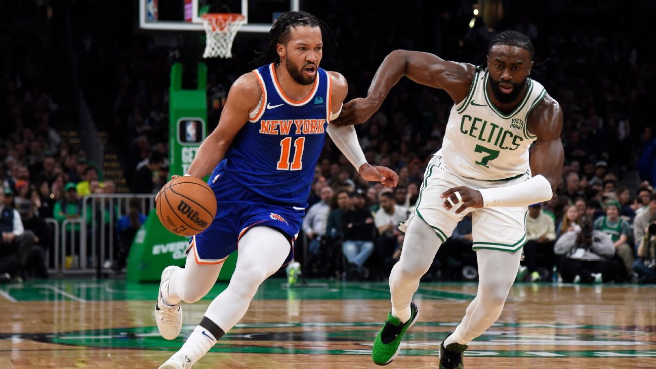 Jalen Brunson driving on Jaylen Brown in Knicks opening game against Celtics