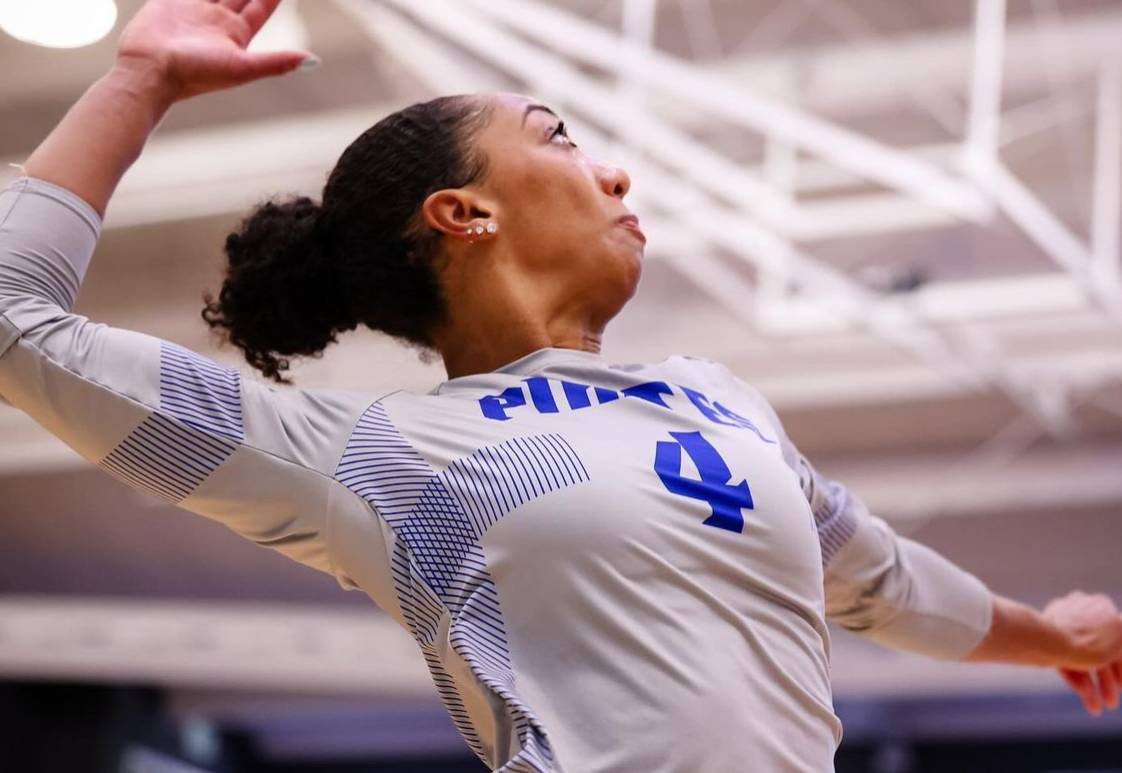 Perri Lucas goes up for a kill