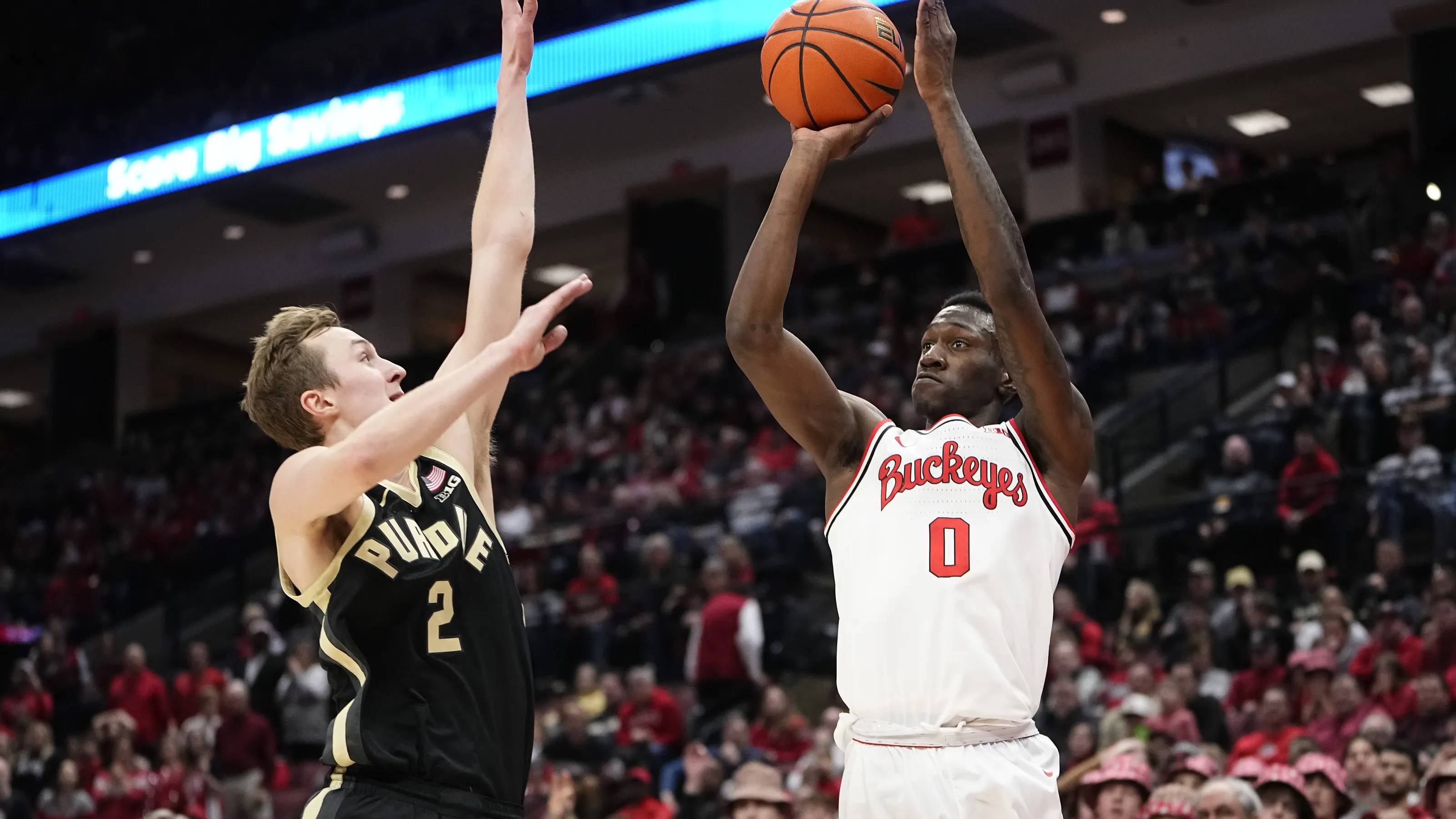 Scotty Middleton shooting over a Purdue defender.