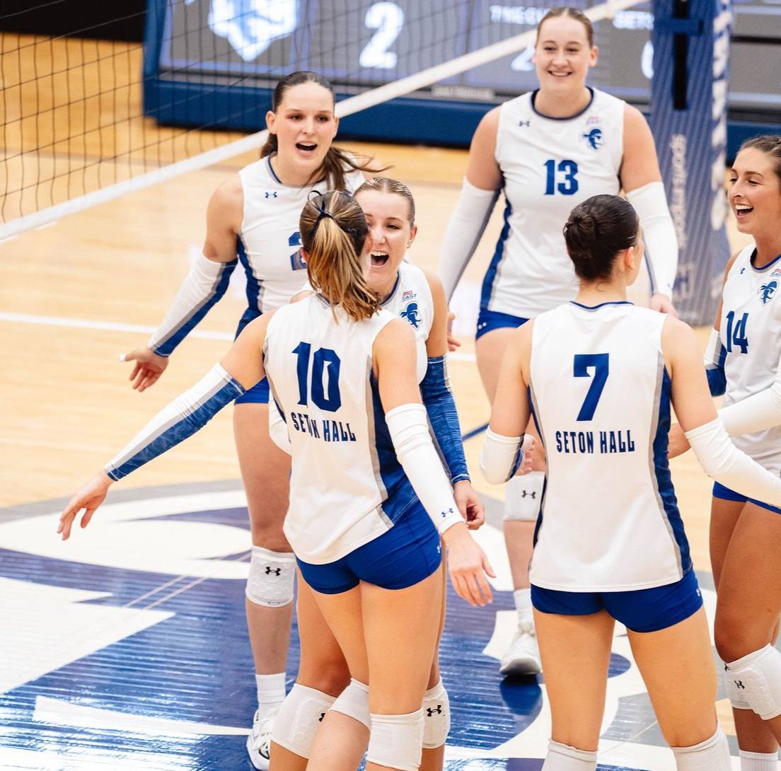 Seton Hall Volleyball Celebrate after winning a point