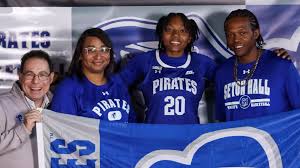 Trishay Collins with family and Seton Hall Pirates Head Coach Bozzella