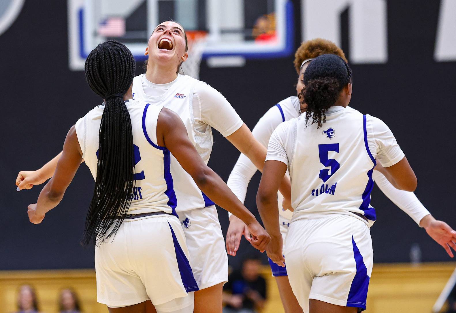 Amari Wright and Faith Masonius chest bump