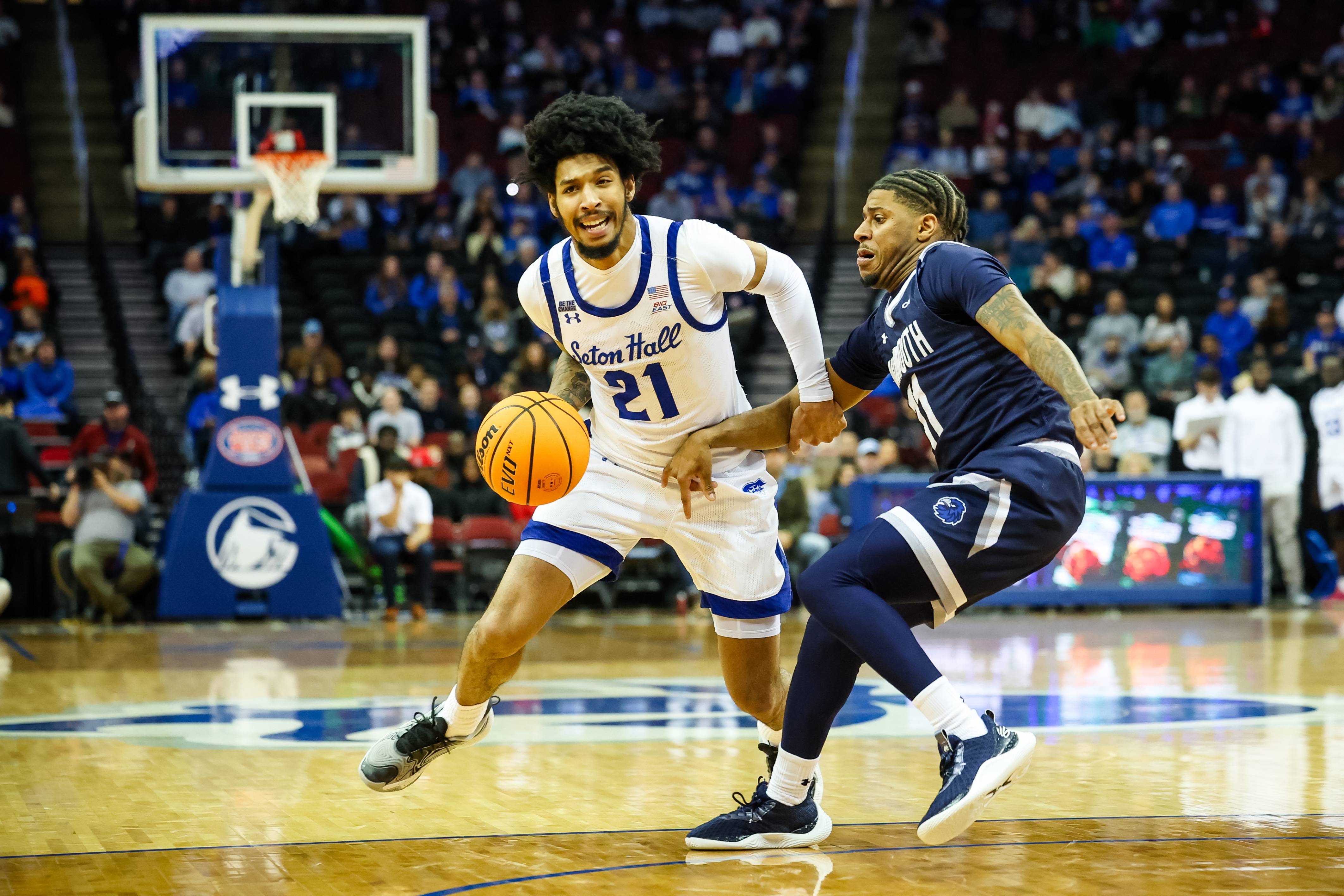 Isaiah Coleman (left) scored 20 points for the Pirates in the loss to Monmouth.